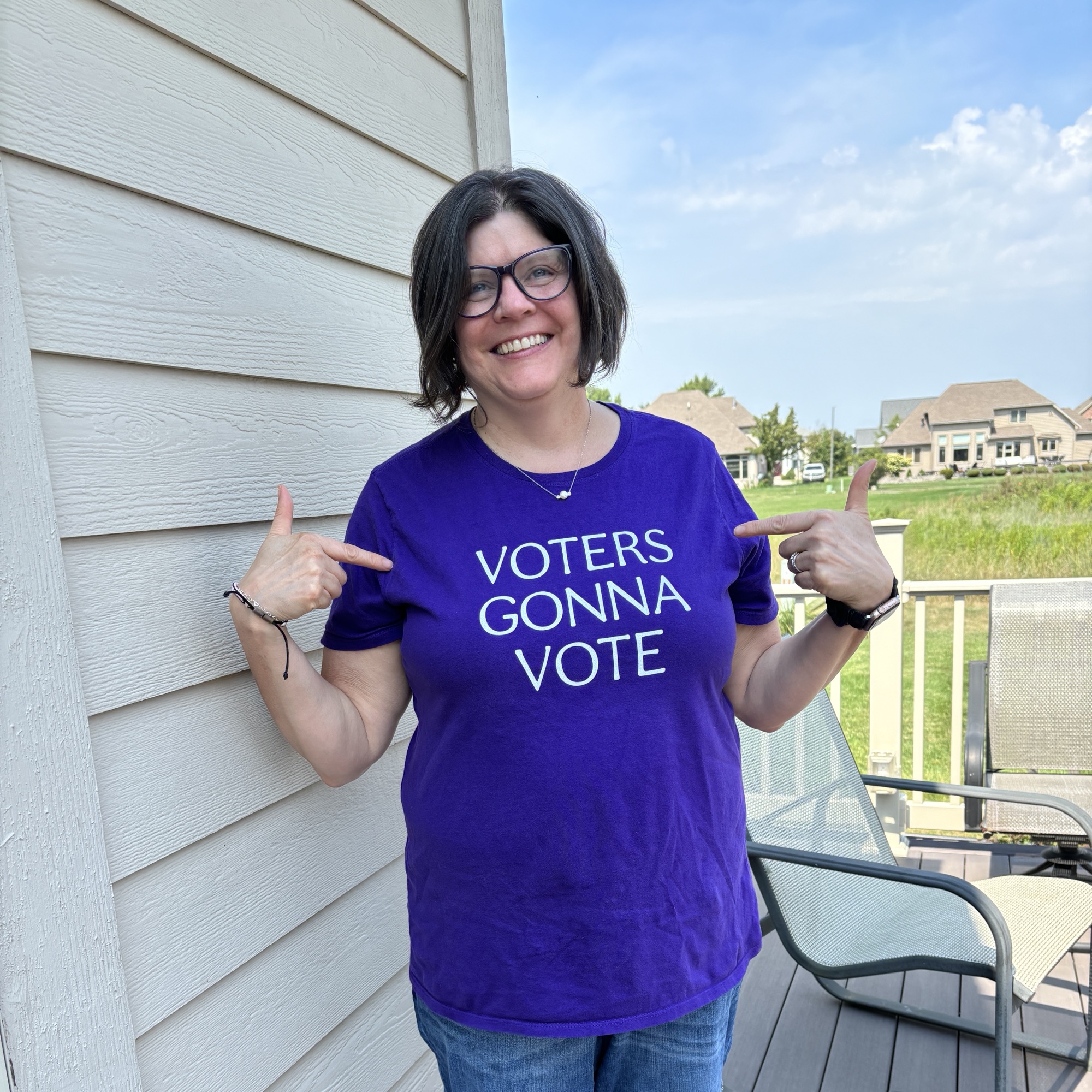photo of women with voting t-shirt